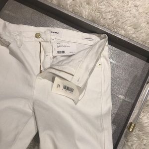 White Frame le Sylvie kick jeans.